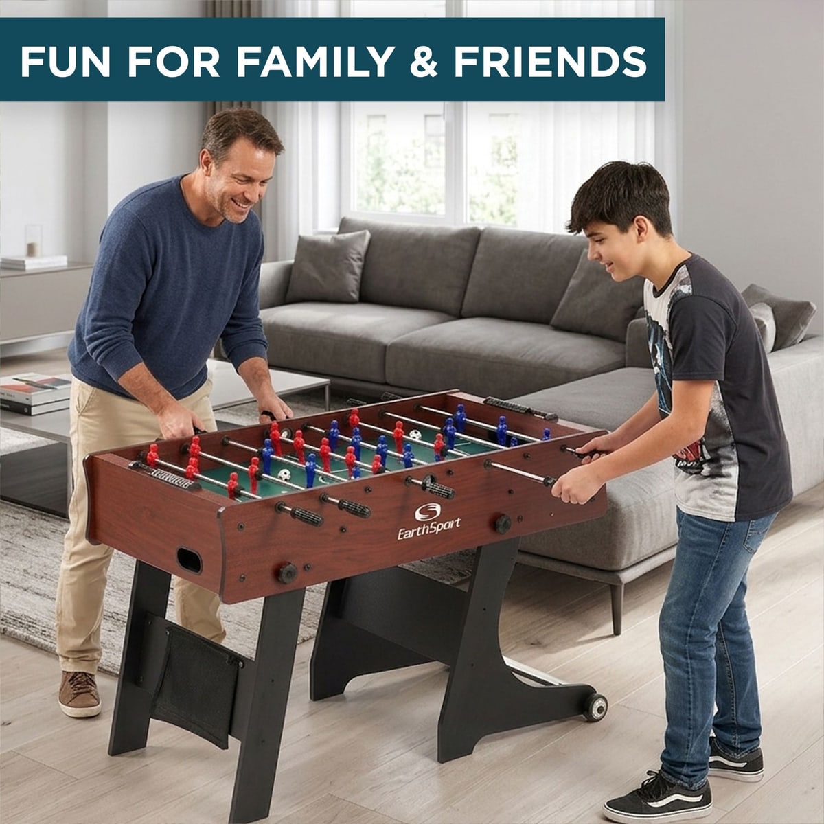 Father and son playing the EarthSport 48-inch foosball table.
